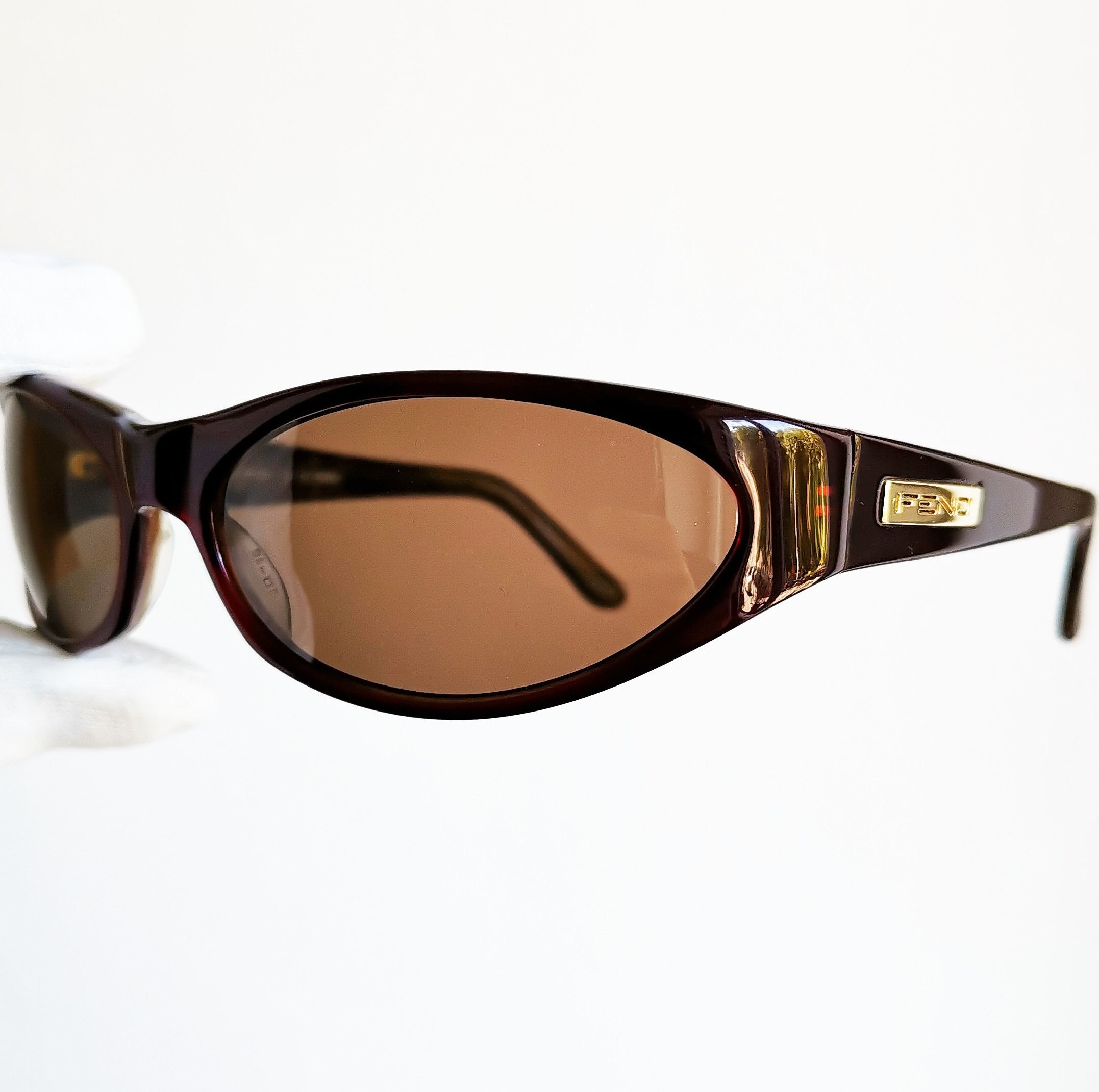 Fendi 90s Burgundy Oval Sunglasses with Gold Accents Fendi FF Crystal Metal Oval Sunglasses | Neiman Marcus main image 2