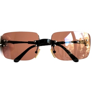 CHANEL sunglasses vintage black oval square rectangular wrap rimless frameless 4005 Migos Rihanna Kylie Jenner Bella Hadid Lady Gaga 90s y2k