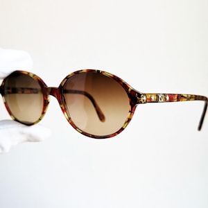 YVES SAINT LAURENT vintage sunglasses Ysl rare oval gold studs 5045 red clear avant garde frame Migos designer Rihanna Lady Gaga Tupac 90s
