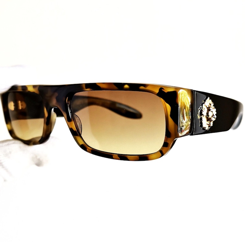 VERSACE vintage Sunglasses rare black gold lion head square frame Gianni VERSUS E02 rectangular 90s brown yellow lens Migos Rihanna designer image 1