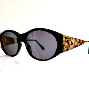 Lunettes de soleil vintage ovales EMMANUELLE KHANH rares animalier rondes fabriquées en France Paris, or marron noir 7980, cadre oversize de style français des années 80 et 90
