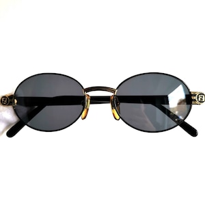 FENDI occhiali da sole vintage oro nero ovale FF logo monogramma FS304 montatura rara Tupac Biggie 2Chainz Migos Rihanna Lady Gaga Kylie Jenner anni '90 y2k