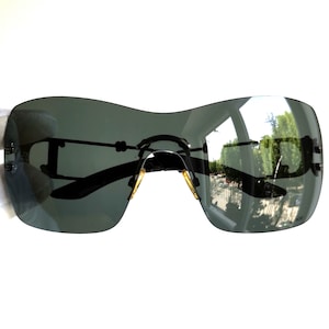 SWEETEST DIOR vintage sunglasses black mask frameless rimless wrap square Christian Dior pzl95 flowers rhinestone frame 90s by John Galliano