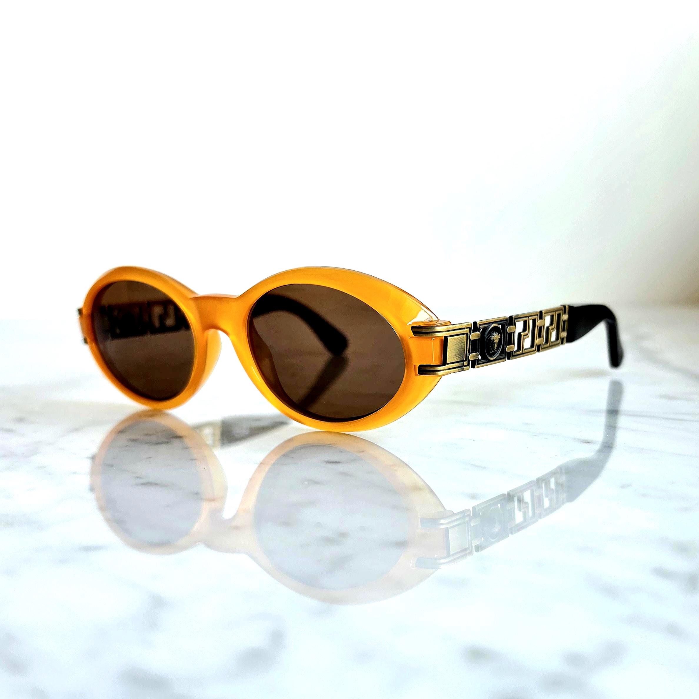 VERSACE Vintage Sunglasses Gold Orange Oval Medusa Gianni 486