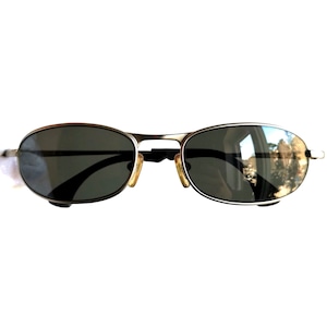 CALVIN KLEIN vintage zonnebril ovaal klein klein zilvergrijs Ck 2023 29 Migos Rihanna ontwerper Kylie Jenner Bella Hadid frame nieuw NOS 90s y2k