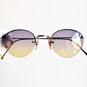 CALVIN KLEIN vintage sunglasses rare oval round half rim rimless frameless gold Rihanna Migos Ck frame made in Japan purple orange lens 90s