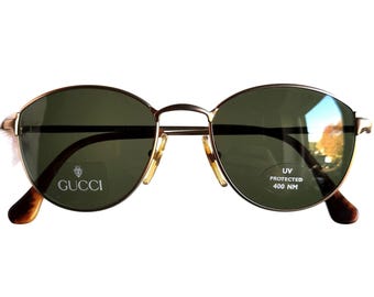 Óculos de sol GUCCI vintage dourado tartaruga marrom GG1236/S armação arredondada lente verde NOS anos 90