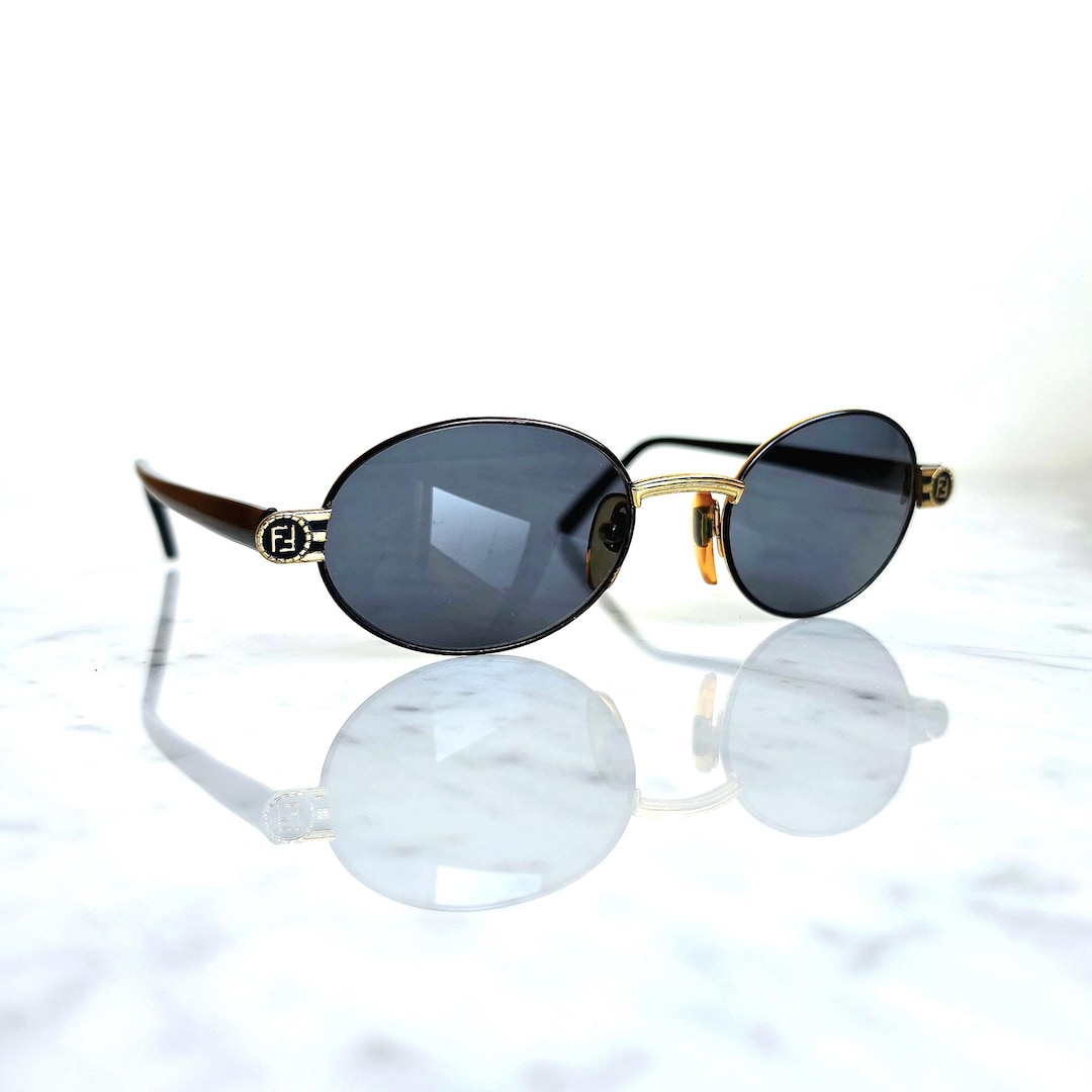 FENDI Vintage Sunglasses Gold Black Oval FF Monogram Logo FS304