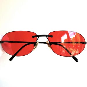 VERSACE vintage sunglasses oval red lenses black frameless rimless R44 VERSUS frame Gianni 90s y2k Migos 2Chainz Rihanna Bella Hadid new NOS
