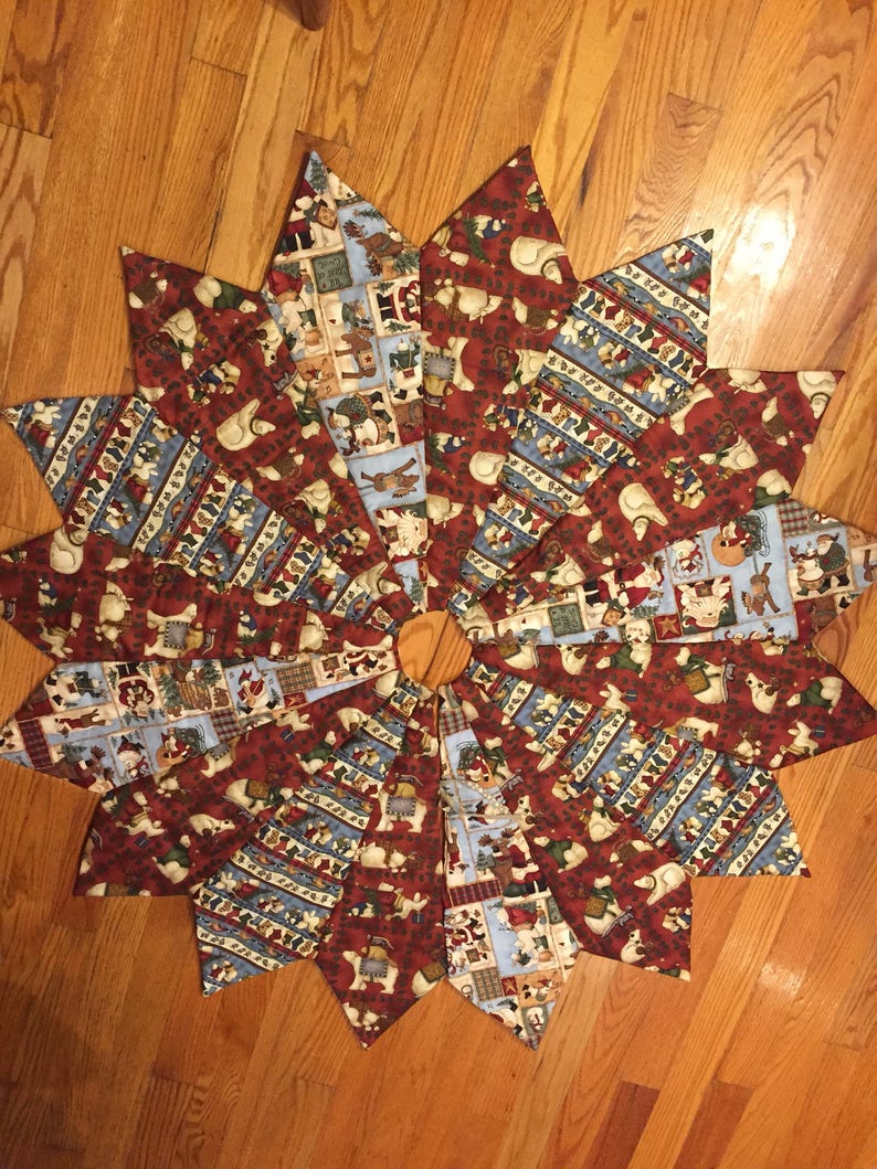 blue 56 inch diameter wildlife burgundy Teresa Kogut fabric Christmas tree skirt quilted polar bear skirt