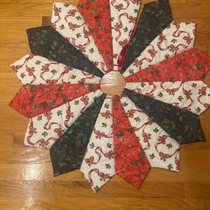 Christmas tree skirt, quilted, holly, ribbon, red, Victorian, gold accents, poinsettia,