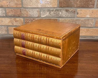 Caja fuerte antigua con forma de libro secreto encuadernada en cuero, circa 1930