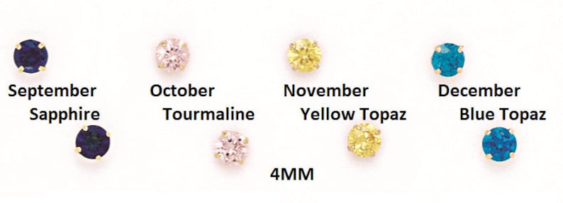 May include: Four 4mm gemstone earrings in different colors. The earrings are set in gold and feature a sapphire, tourmaline, yellow topaz, and blue topaz.