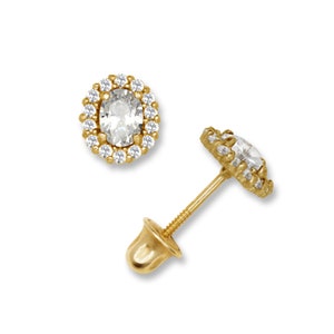 May include: A pair of gold oval stud earrings with a halo of small clear stones.