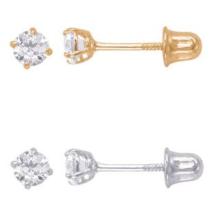 May include: A pair of stud earrings with a clear round stone set in a gold or silver setting. The earrings have a screw-back closure.