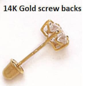 May include: 14K gold screw back earring findings. The screw back is gold and has a small, round, flat top. The post is gold and has a small, round, flat bottom.