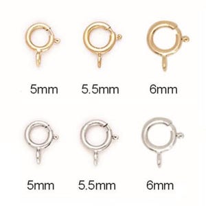 May include: Six gold and silver jump rings, each with a spring clasp. The rings are 5mm, 5.5mm, and 6mm in diameter.