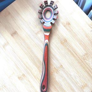 Pasta \ Spaghetti Spoon

Measures 12 x 3 inches