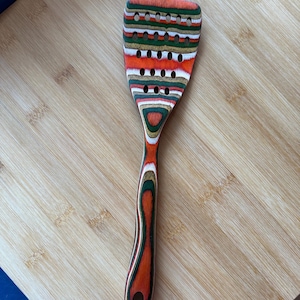 Slotted Spatula 

Measures 12 x 3 inches