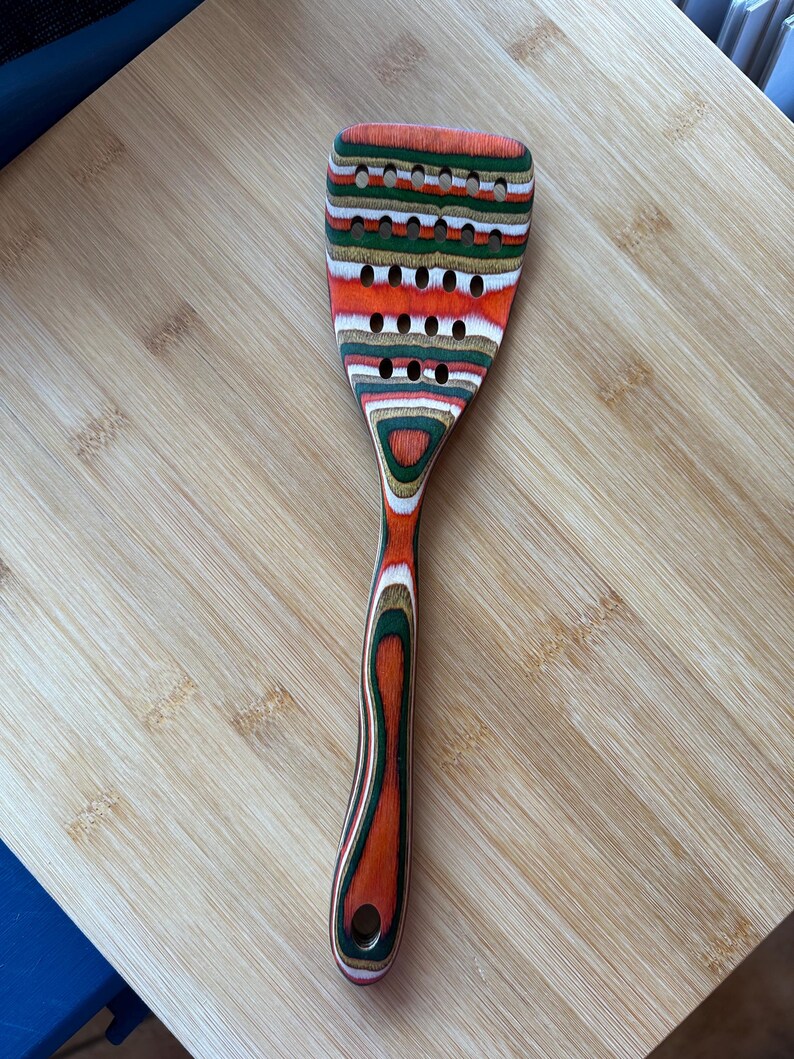 Slotted Spatula 

Measures 12 x 3 inches