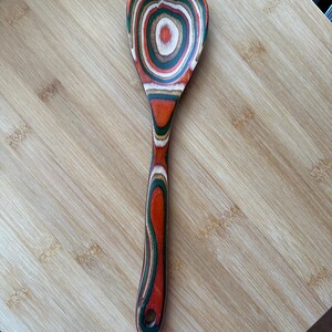 Spoon 

Measures12 x 3 inches