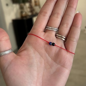 Azabache and evil eye dainty red cord bracelet
