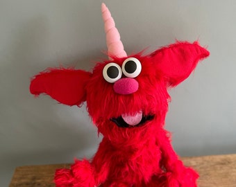 Yuno, Muppet-marionet, Professionele handpop, Monster, Elmo-bontpop, Buiksprekerpop, Poppenspelerpop, handstaven, Bontmonster