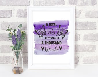 May include: A white framed print with a purple watercolor background and two black butterflies. The text reads "A loyal sister is worth a thousand friends" with two hearts on either side of the word "friends".