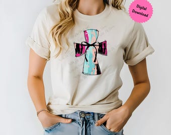 Peut inclure: T-shirt beige avec un motif de croix colorée. La croix présente un dégradé de couleurs turquoise, rose et noir, avec un nœud noir. Un cercle rose avec l'inscription "Digital Download" est en haut à droite.