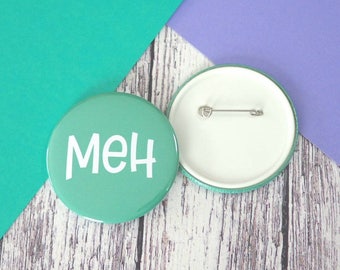 Meh quote badges (25mm, 45mm or 58mm), keyrings (45mm or 58mm) and pocket mirrors (58mm)