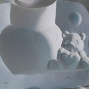 May include: A rustic wooden sign with the text "Welcome to our home" in white lettering. The sign features a distressed finish and a simple, inviting design, perfect for entryway decor.