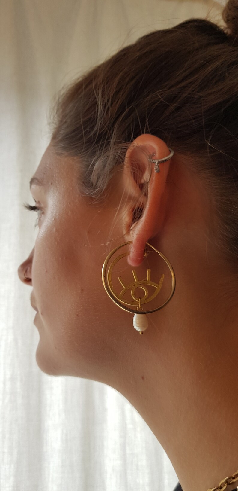 graphic Paloma evil eye style modern 24k gold plated earrings with freshwater pearl drops