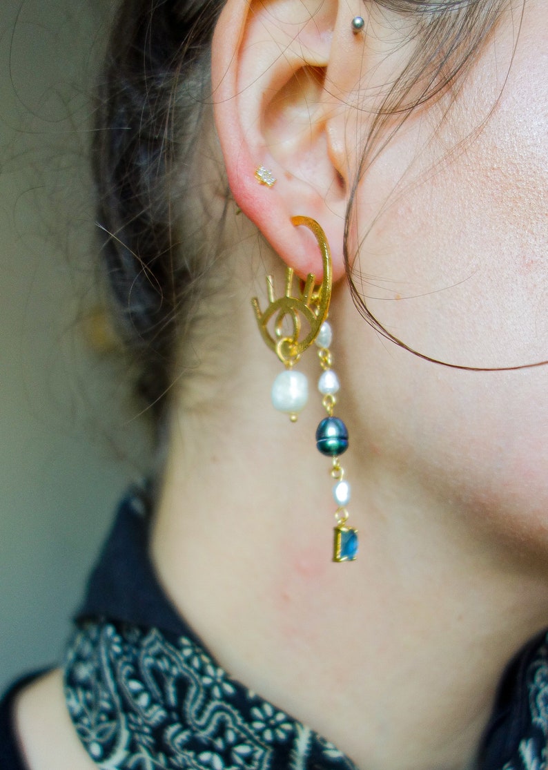 graphic Paloma evil eye style modern 24k gold plated earrings with freshwater pearl drops