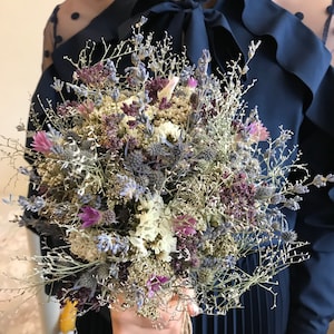 Bridal bouquet of dry roses and wild flowers, wedding bouquet, flower wedding, field bouquet, wedding accessory