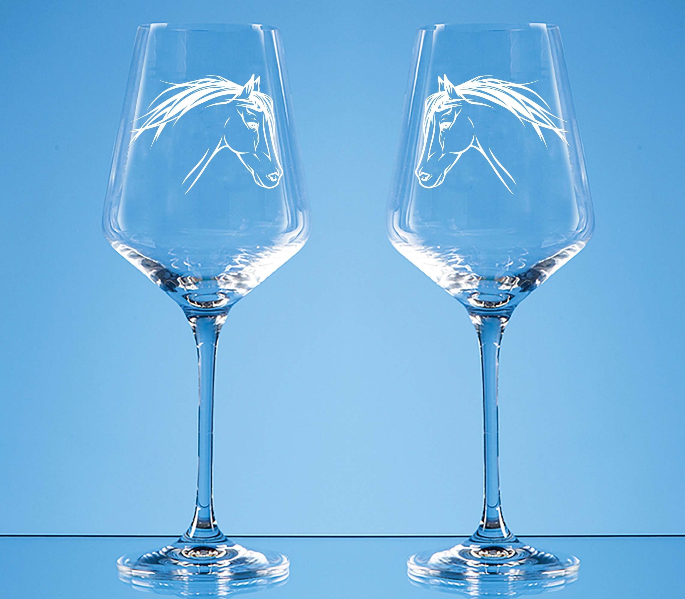 Pair of Equine inspired stemmed wine glasses.