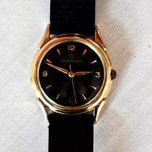 Montre-bracelet suisse pour homme Eternamatic Montre automatique des années 1950