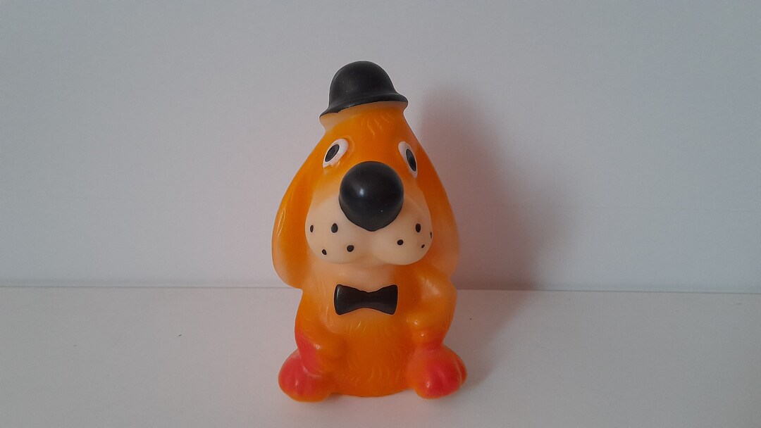 View of Orange Dog, Dog With a Bow Tie, Rubber Dog, Dog Figurine, Rubber Animal ...