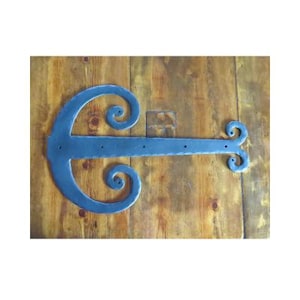 a medieval style door hinge Stock Photo