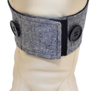Soft hook-and-loop closures at the chest and neck make on-and-off quick and gentle.