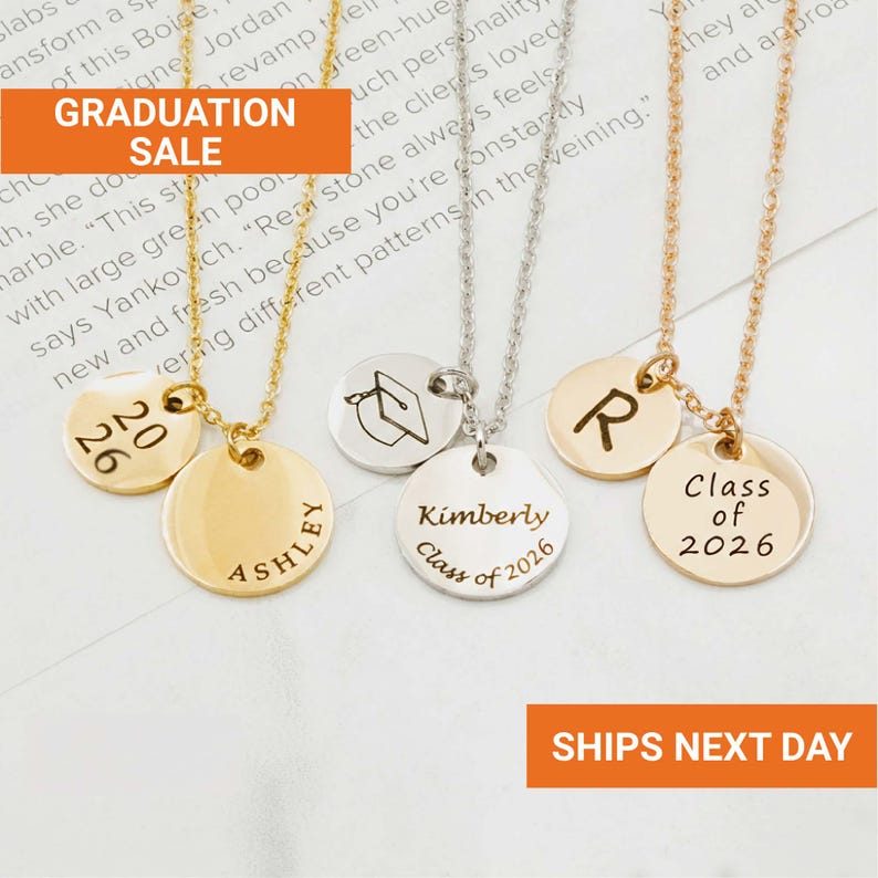 May include: Gold, silver, and rose gold necklaces with personalized round pendants. The pendants feature engraved names, initials, graduation years, and a graduation cap design. The necklaces are displayed on a white background.