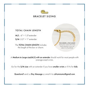 a bracelet with a chain extending from the clasp to the bracelet itself.