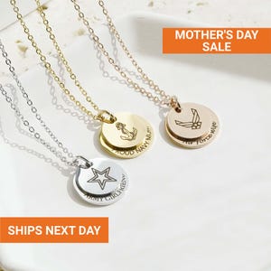 May include: Three pendant necklaces with different designs. One is silver with a star, one is gold with an anchor and the text "PROUD NAVY MUM", and the other is gold with an airplane and the text "Air Force Wife". The text "MOTHER'S DAY SALE" is visible.