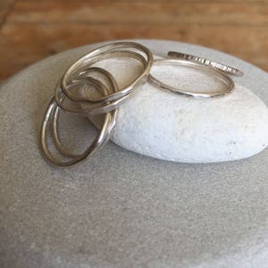 Silver Stacking rings . Assorted textures and sizes