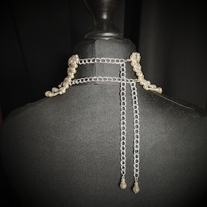 May include: A rustic wooden sign with the text "Welcome to our home" in white lettering. The sign features a distressed finish and a simple, inviting design, perfect for front door decor.