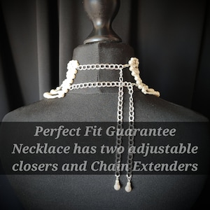 May include: A set of three ceramic vases in varying heights. The vases have a matte finish in shades of cream, beige, and brown. The tallest vase is approximately 10 inches high.