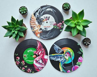 Hand painted vinyl record ornaments with wildlife