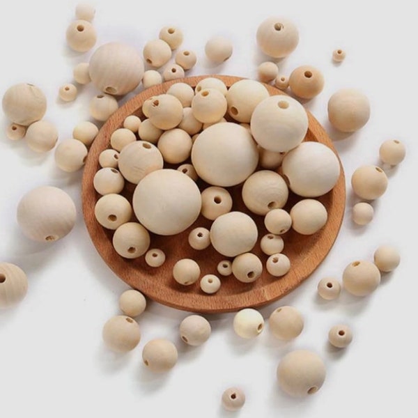 Perles en bois naturelles et sans vernis, fabrication de bijoux, artisanat en bois, macramé et bien d'autres utilisations.