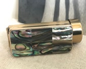 Vintage ladies lipstick holder with mother of pearl back, folding mirror. Collectables cosmetics make-up display theatre mid century