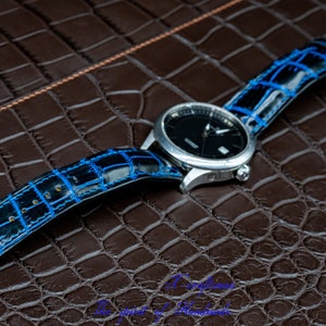 Black and blue genuine alligator watch strap
Handmade personalized sizing watch band
Premium leather strap for black and blue dials
Fine edge finishing watch accessory
Hand-stitched alligator strap