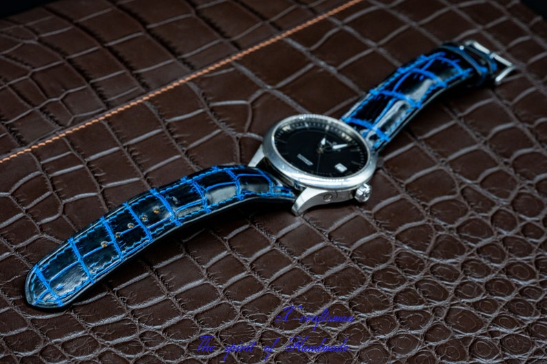 Black and blue genuine alligator watch strap
Handmade personalized sizing watch band
Premium leather strap for black and blue dials
Fine edge finishing watch accessory
Hand-stitched alligator strap